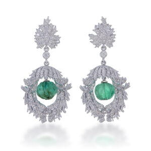 Pair of white gold Timeless Emerald Bloom Earrings with carved green emerald drops and diamond-encrusted scroll motifs.